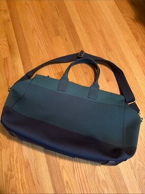 Rothy’s striped green and blue woven Weekender Bag
